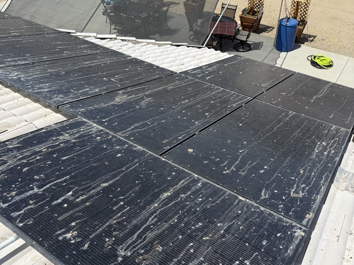 Dusty solar panels before cleaning, reducing efficiency