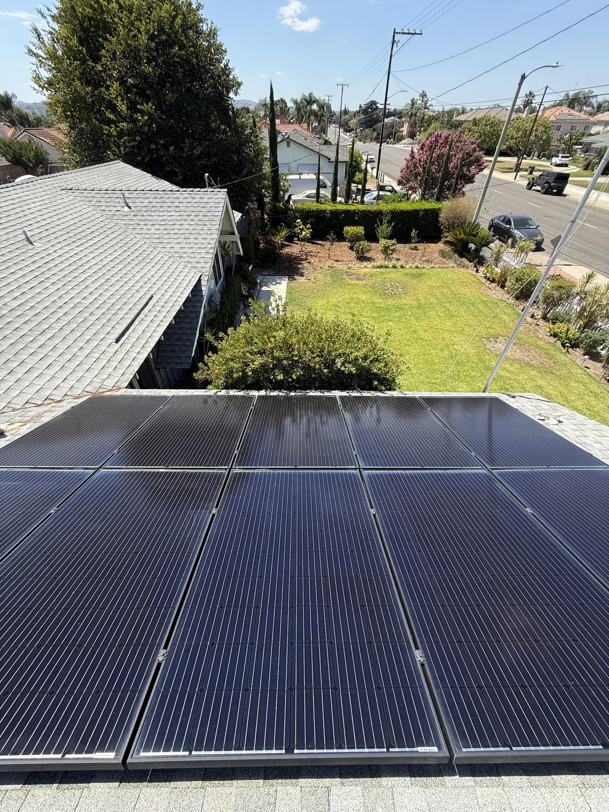 The same solar array spot-free after purified water cleaning